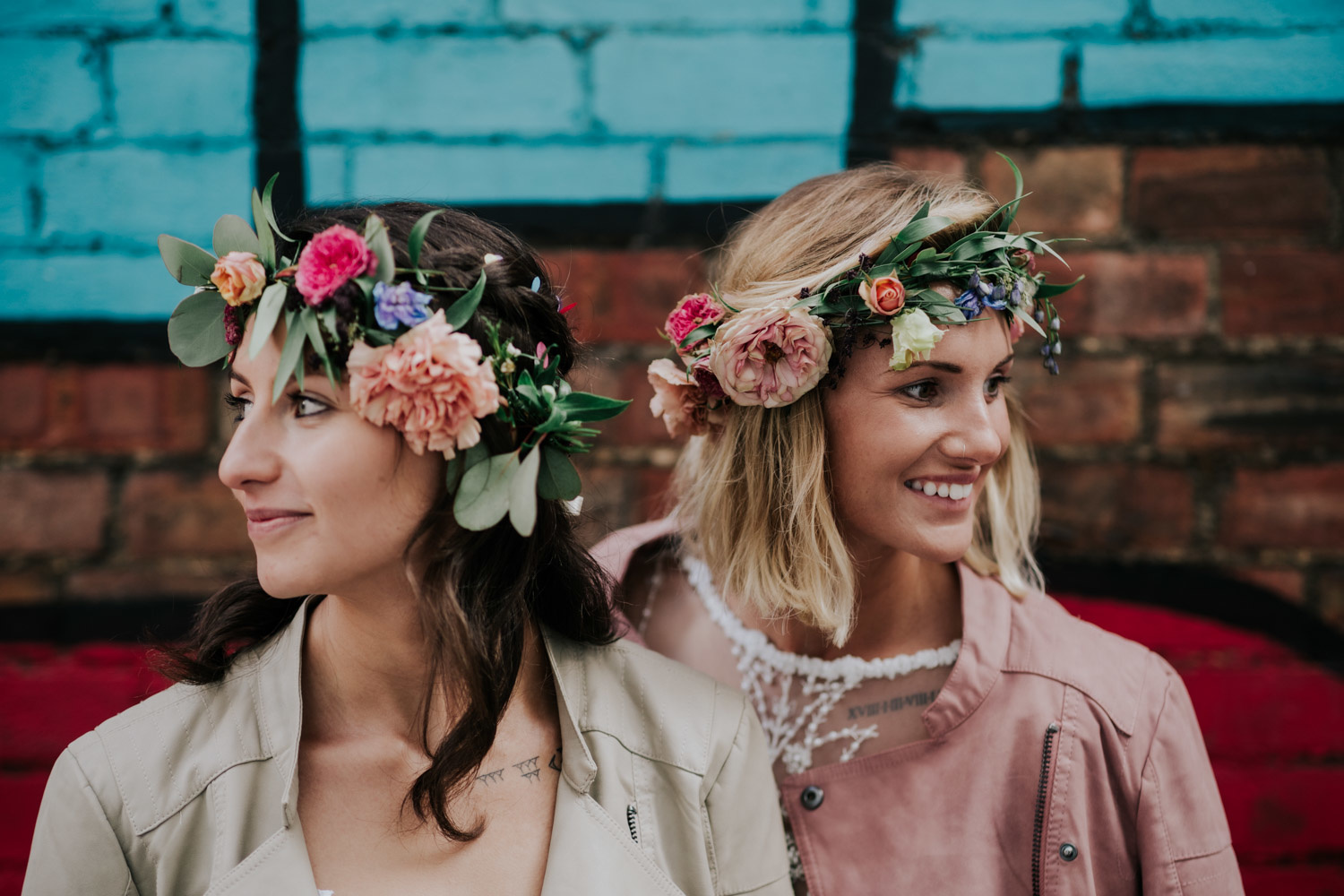 two brides in flower crowns