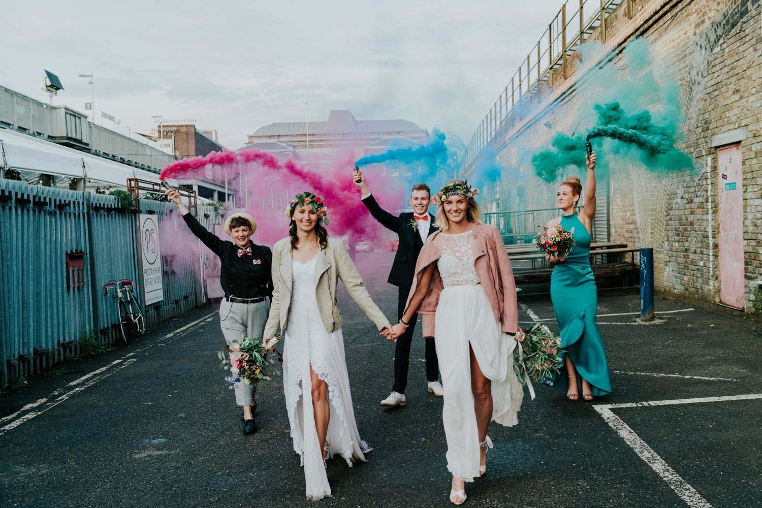 same sex lesbian wedding party with smoke bombs