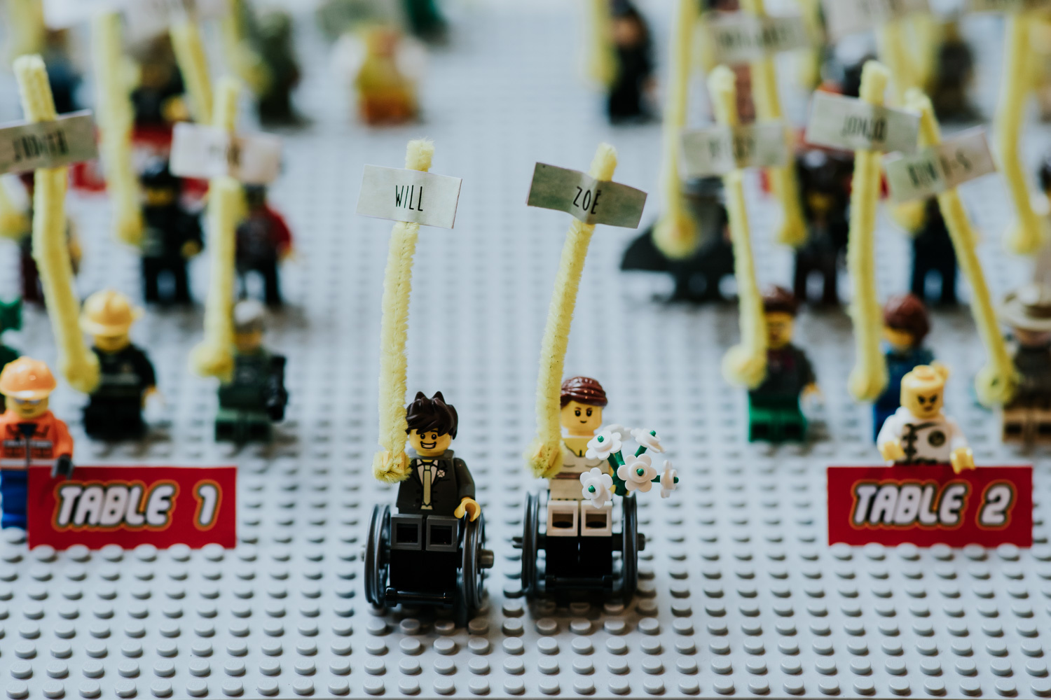lego table plan with bride and groom in wheelchairs
