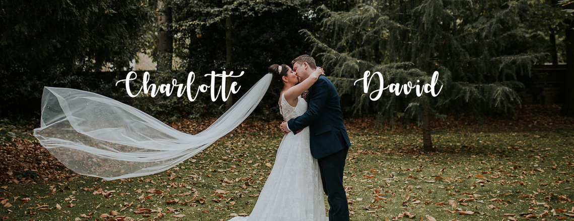 modern wedding photo of bride and groom kissing outdoor wedding in london with veil 