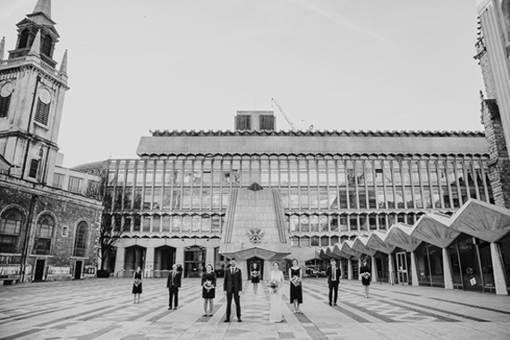 hawksmoor wedding photographer shot alternative group photo at guildhall in london, bride in jenny packham dress