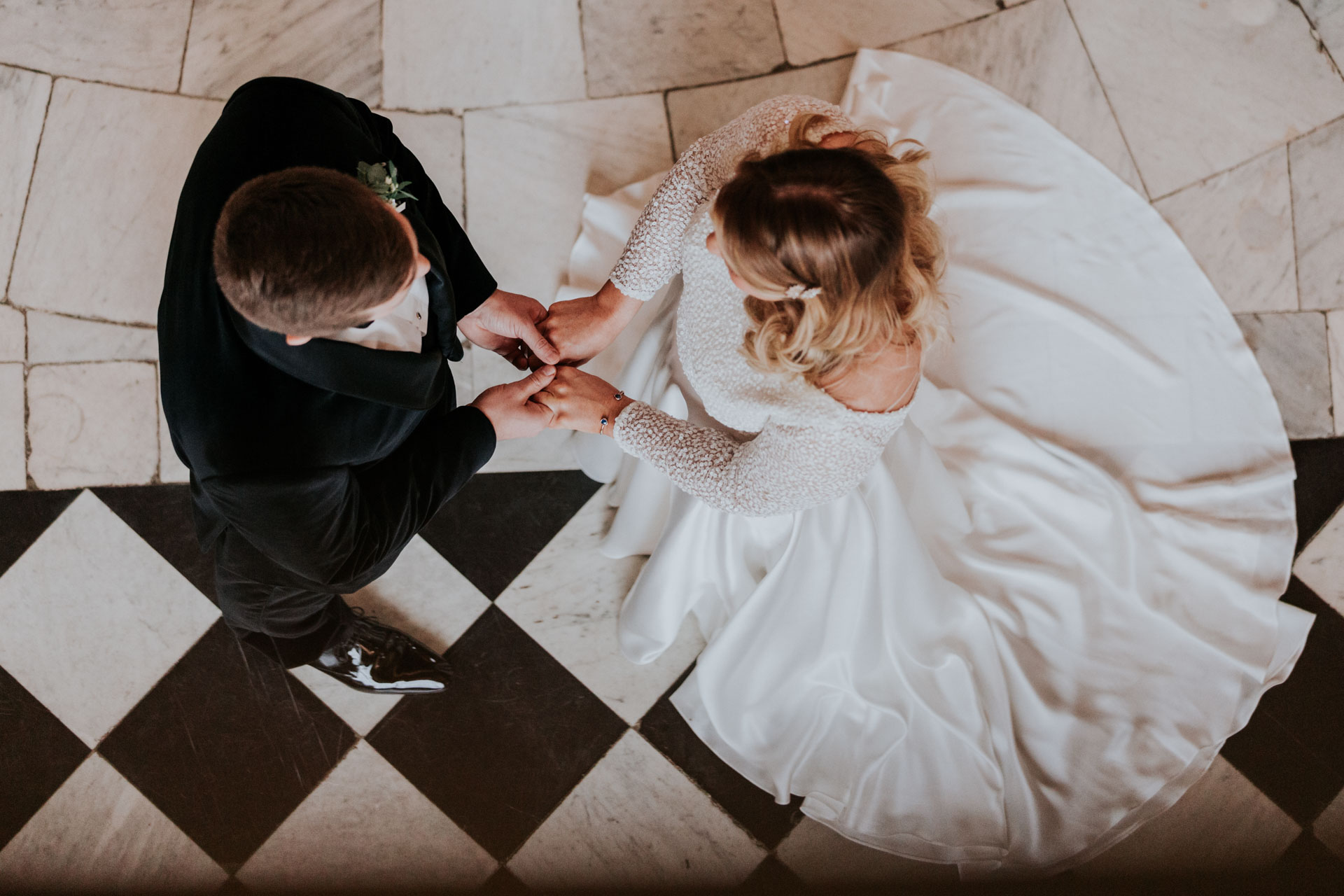 bride and groom exchanging vows at queens house - birds view