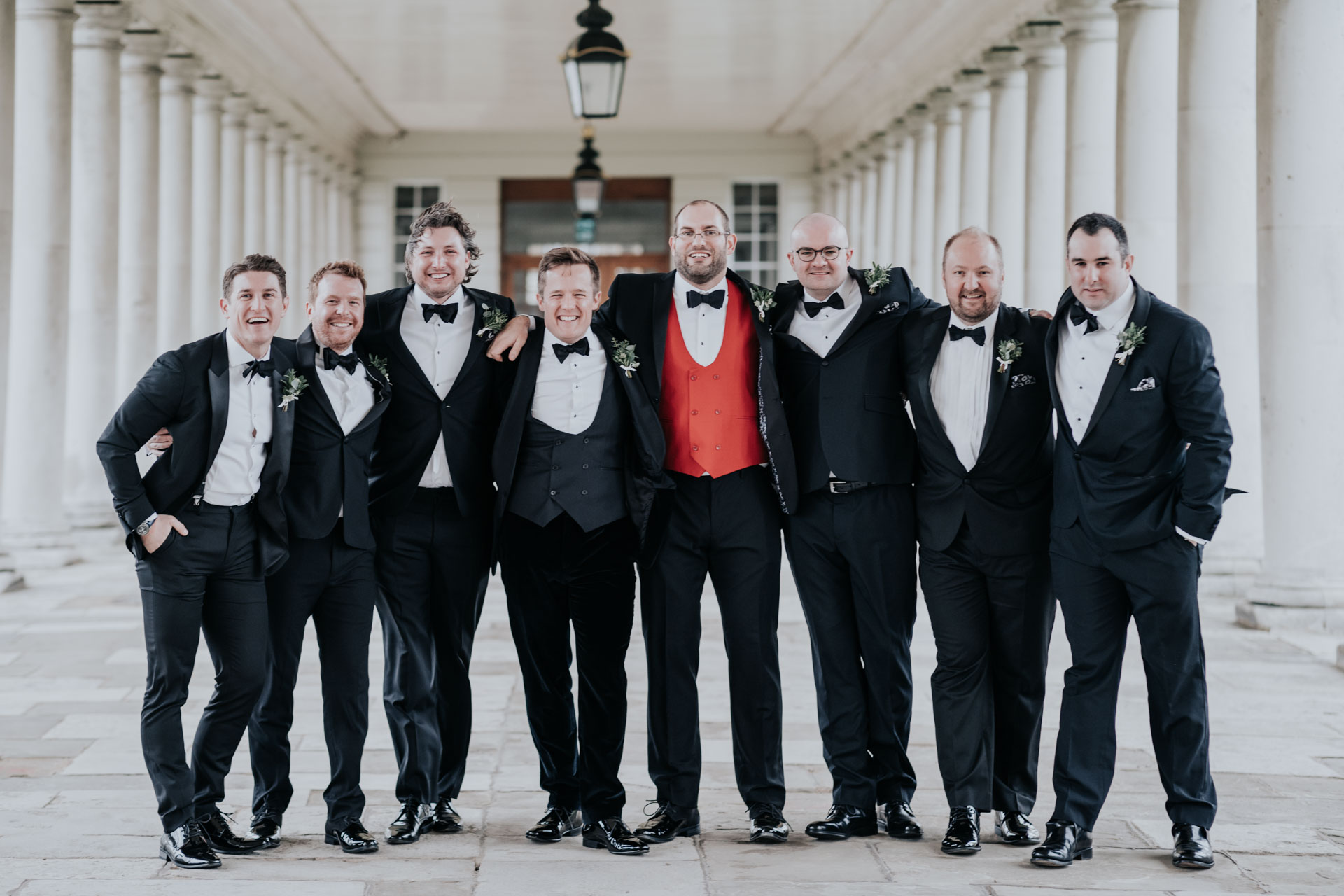 relaxed groom and groomsmen photo at the colonnade at queens house