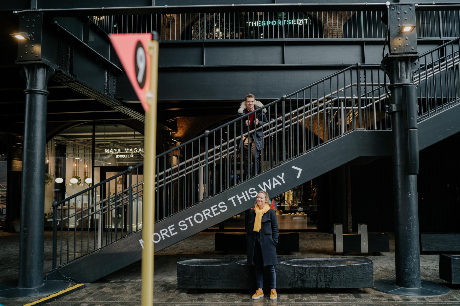 couple on stairs in coal's yard