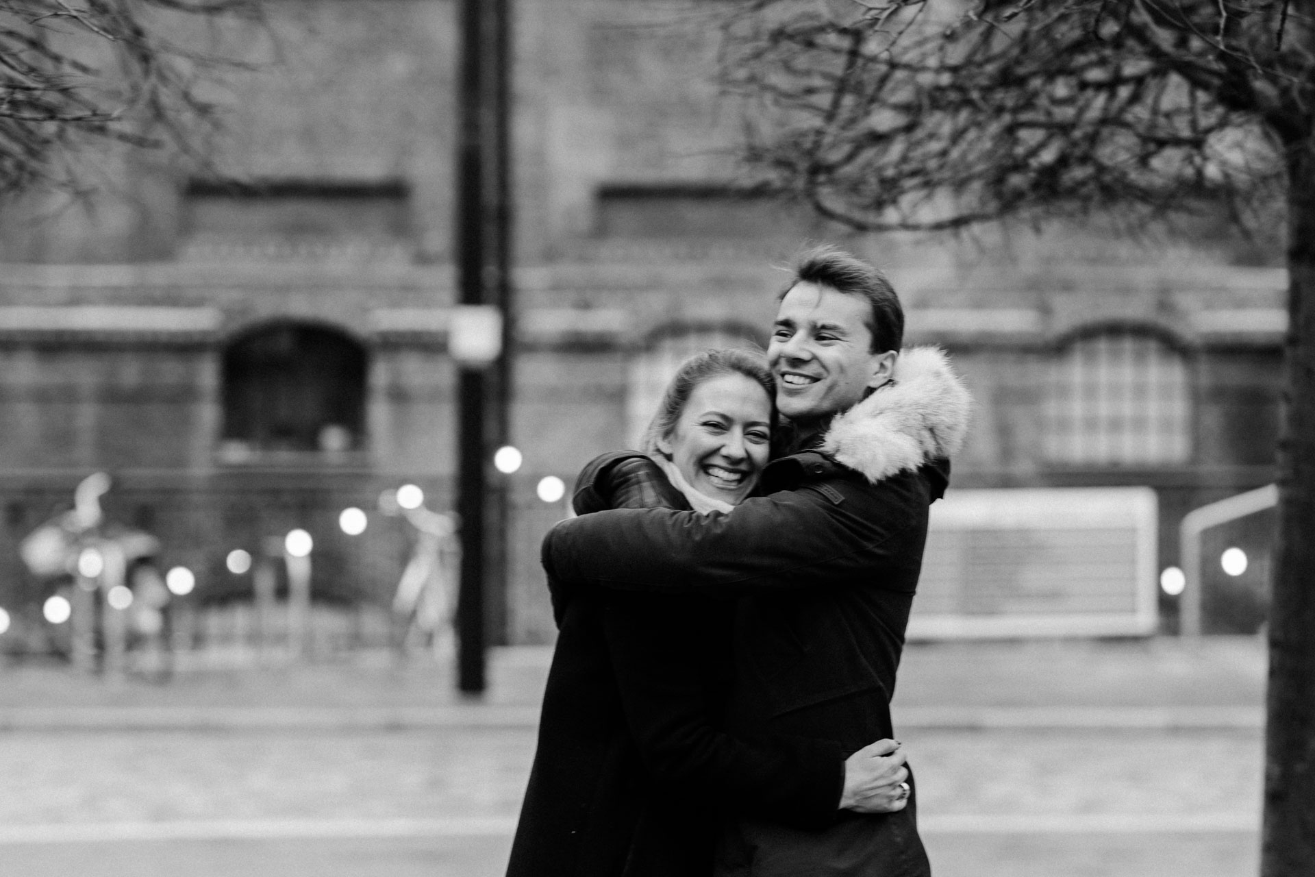 couple hugging in coal's yard in london