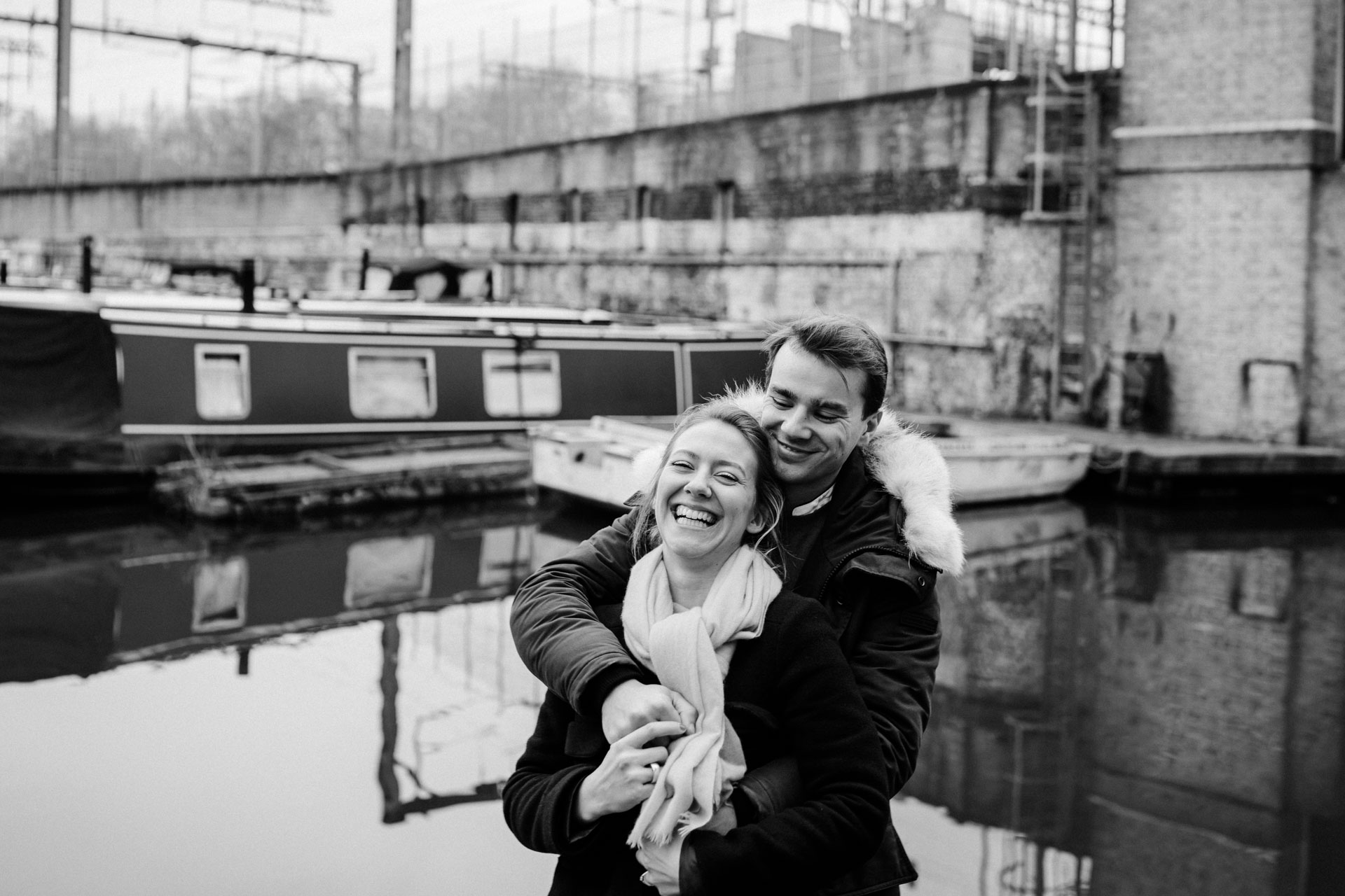 couple hugging in coal's yard near regent's canal