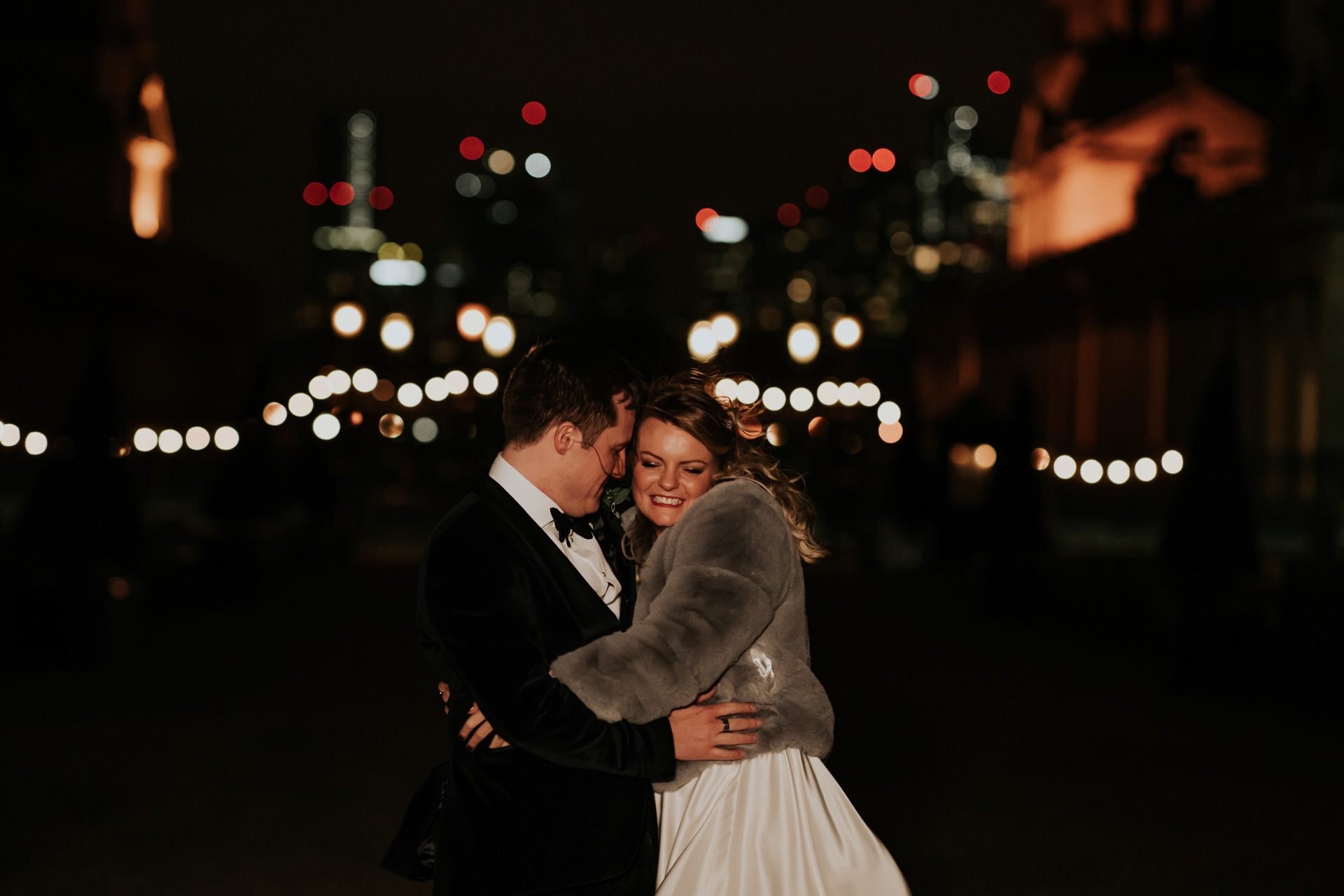wedding couple hugging at night