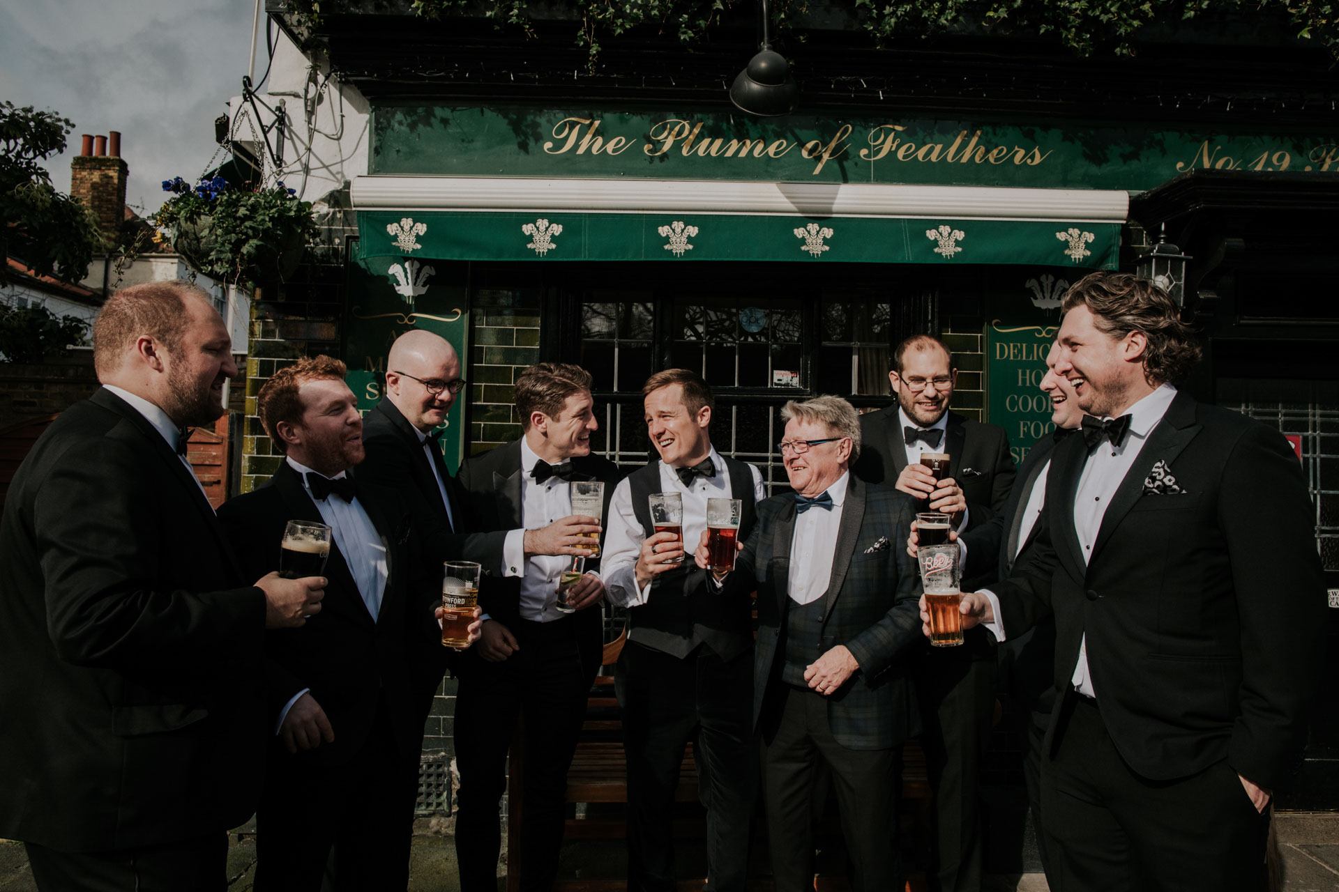 groom having drinks at pub