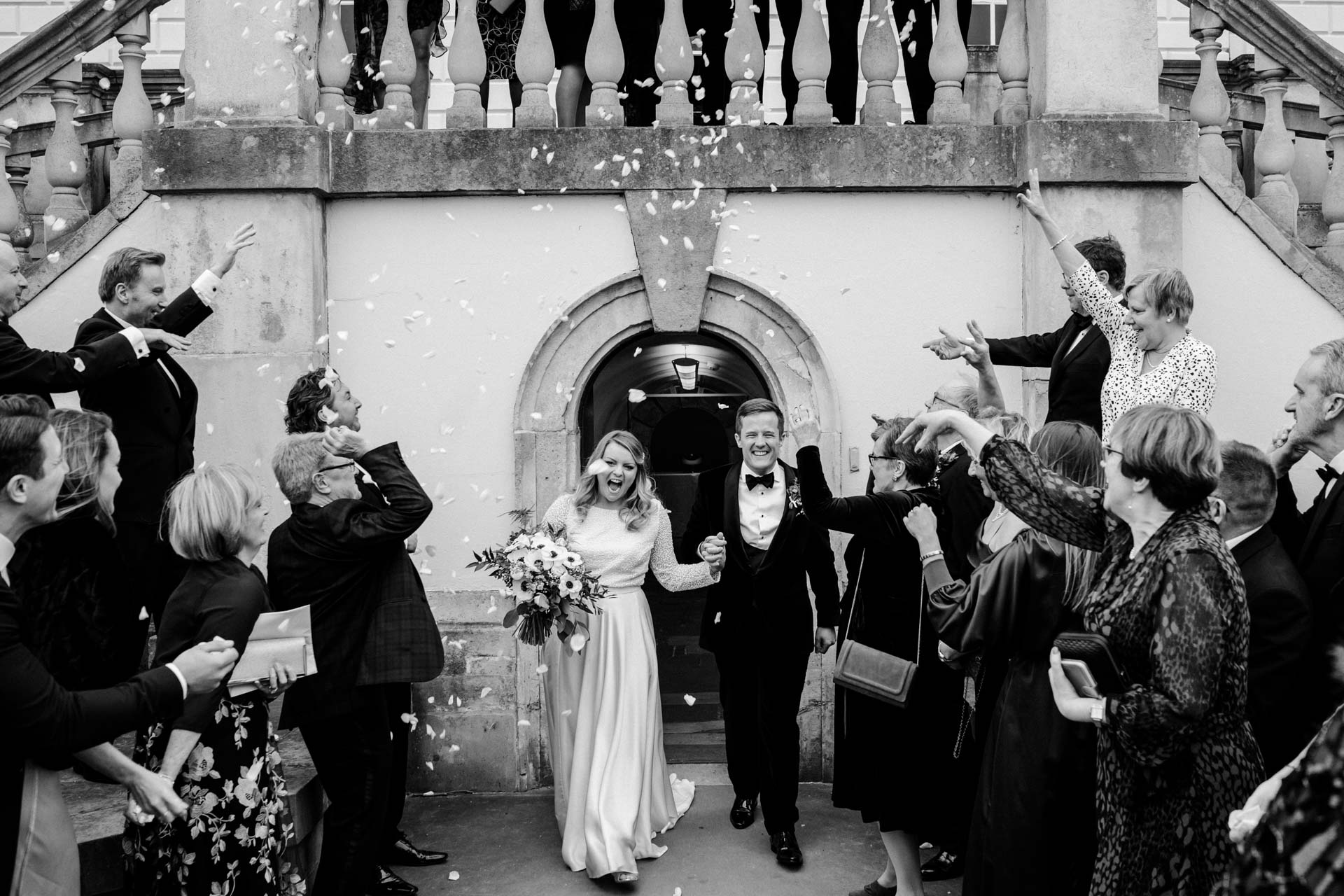 confetti with queens house tulip staircase in the background