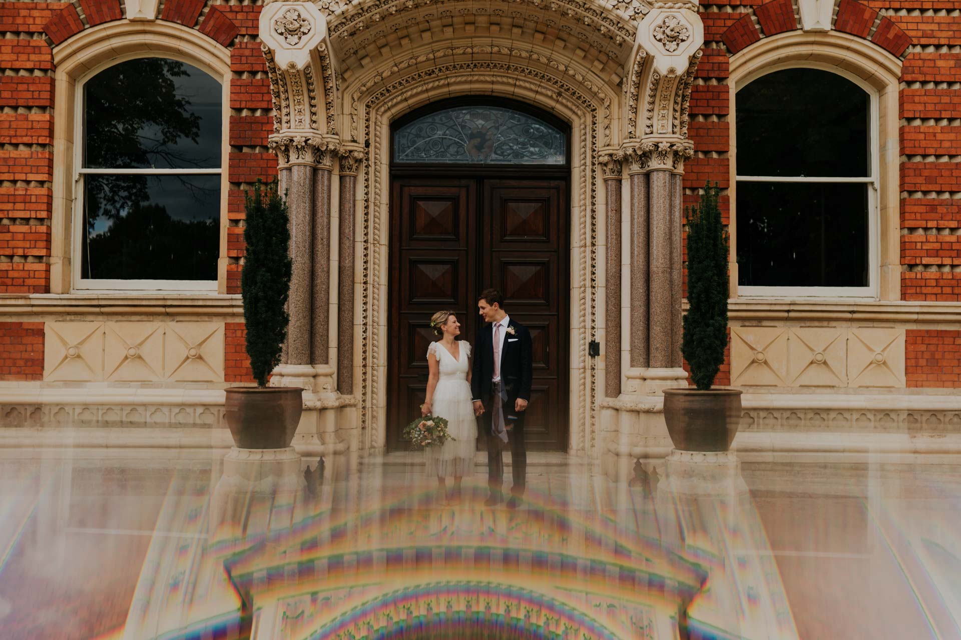 bride and groom with reflection