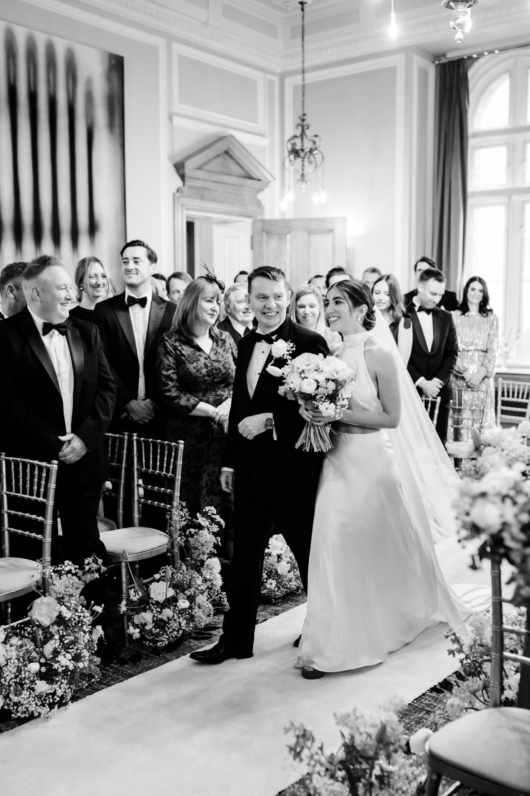 bride and father walking down the aisle