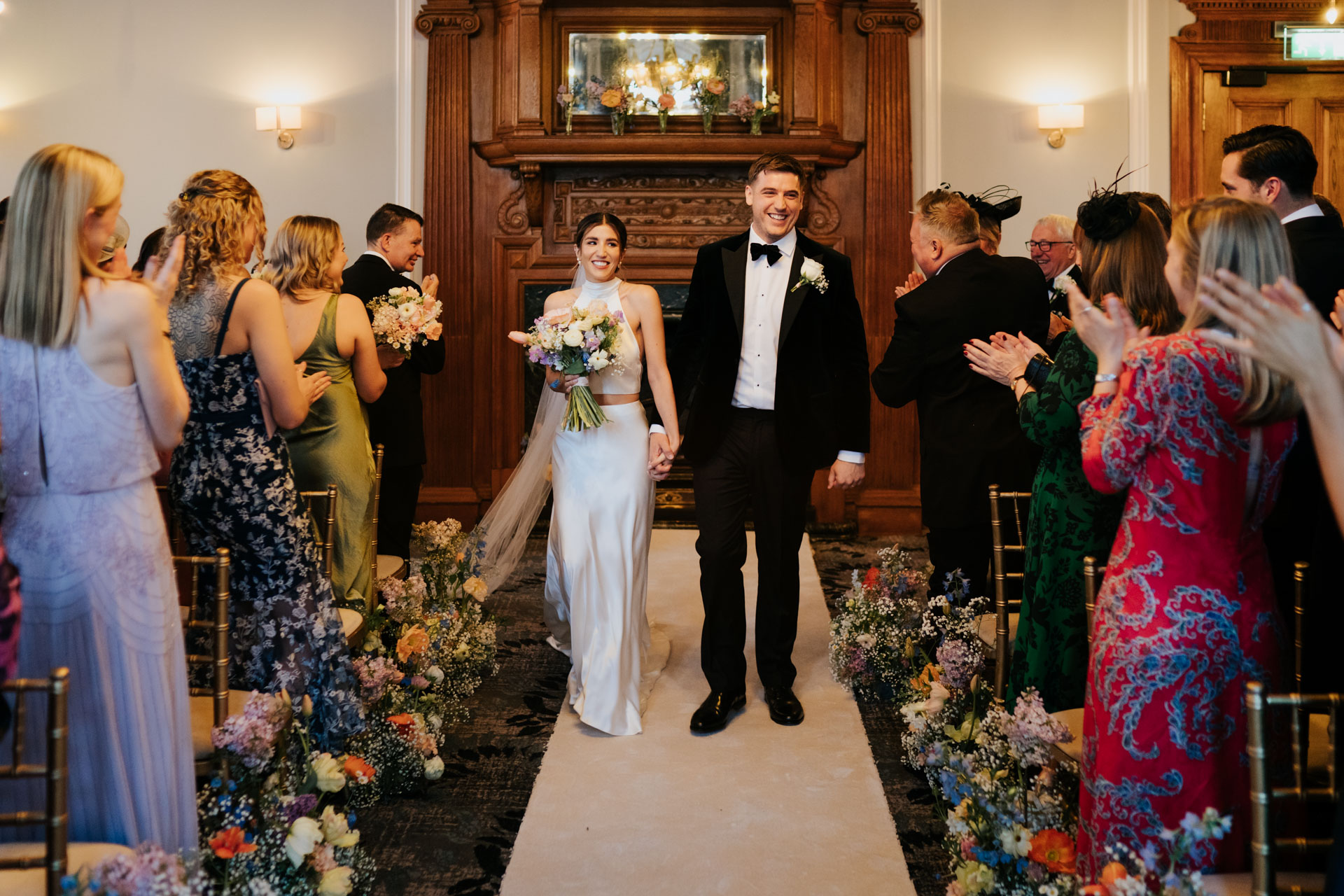 bride and groom leaving andaz ceremony room