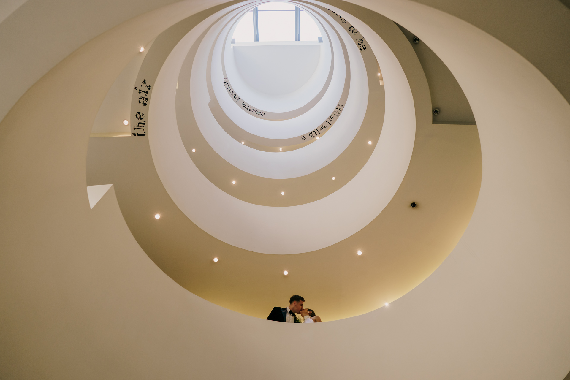 andaz hotel round staircase for 1901 ballroom wedding of Emily and Mark