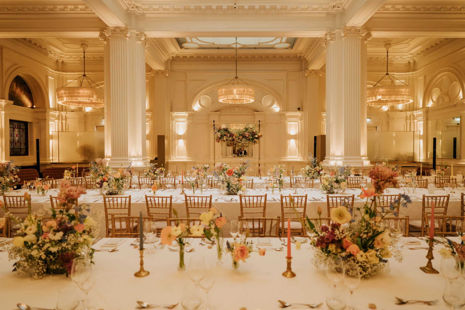 ballroom 1901long tables and flower arrangements