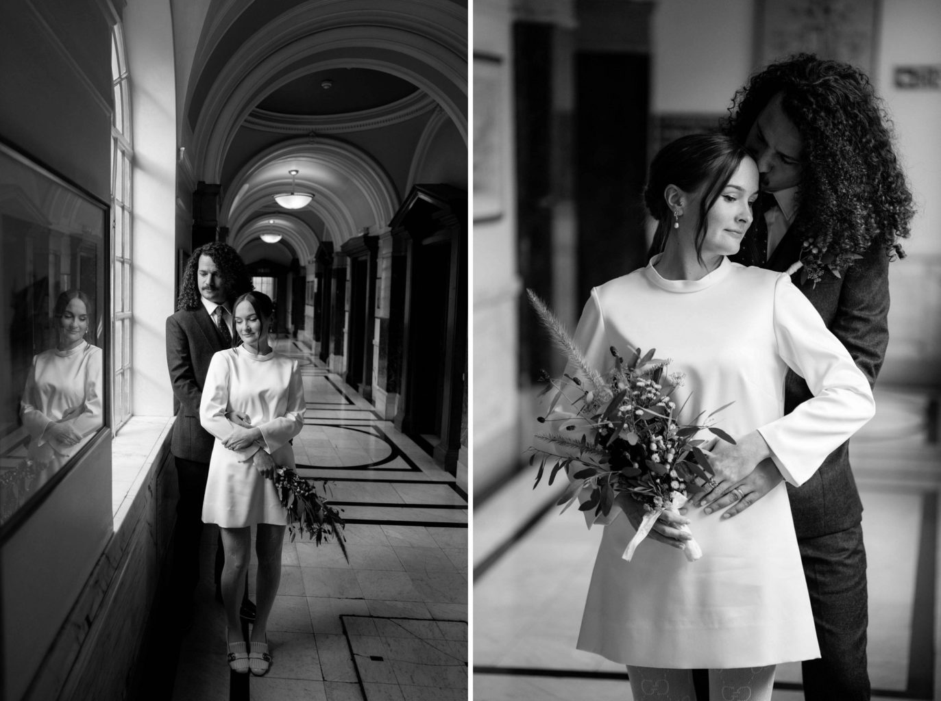 black and white photos of bride in short dress and groom with long curly hair in the hall of islington town hall