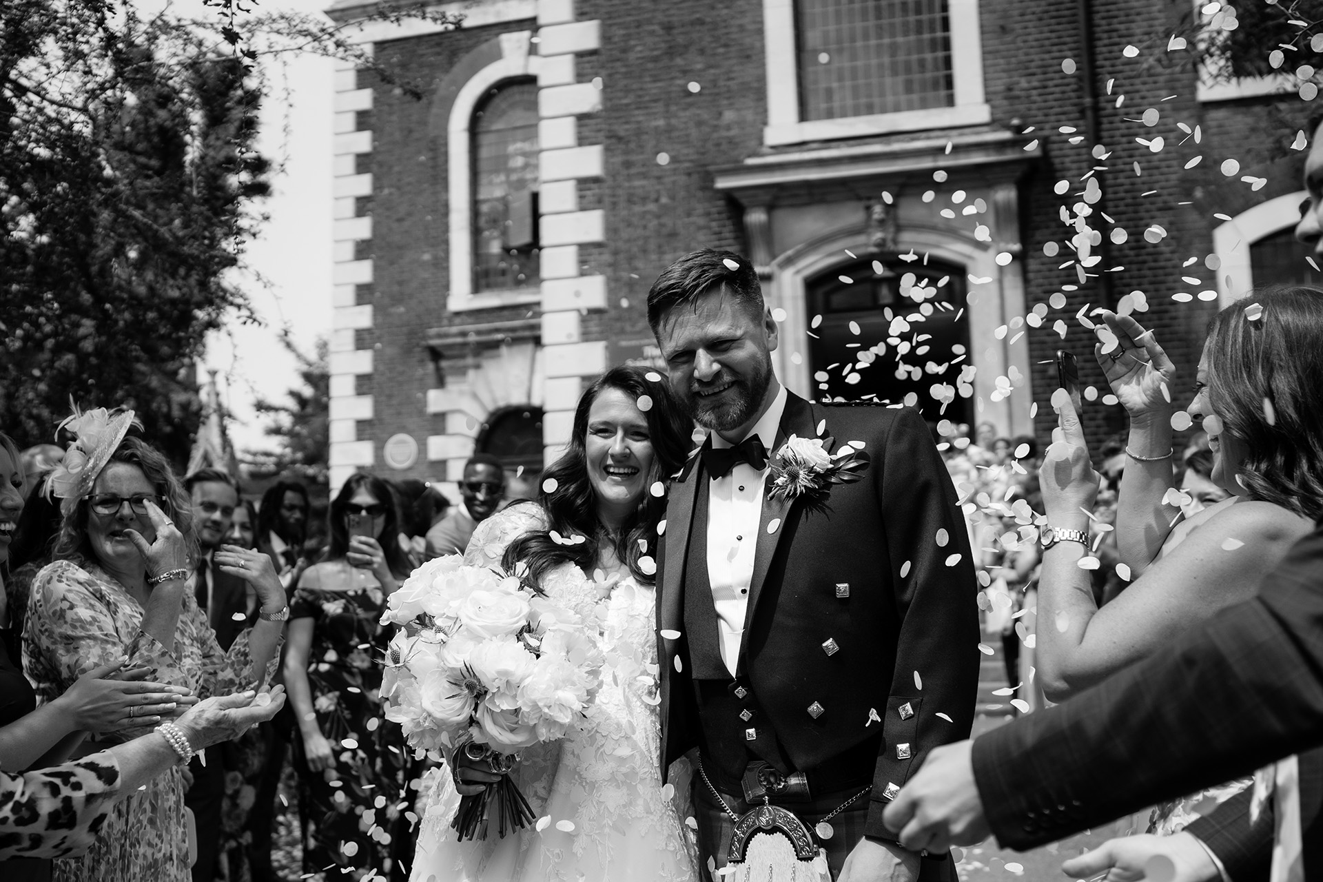 confetti at london wedding in black and white