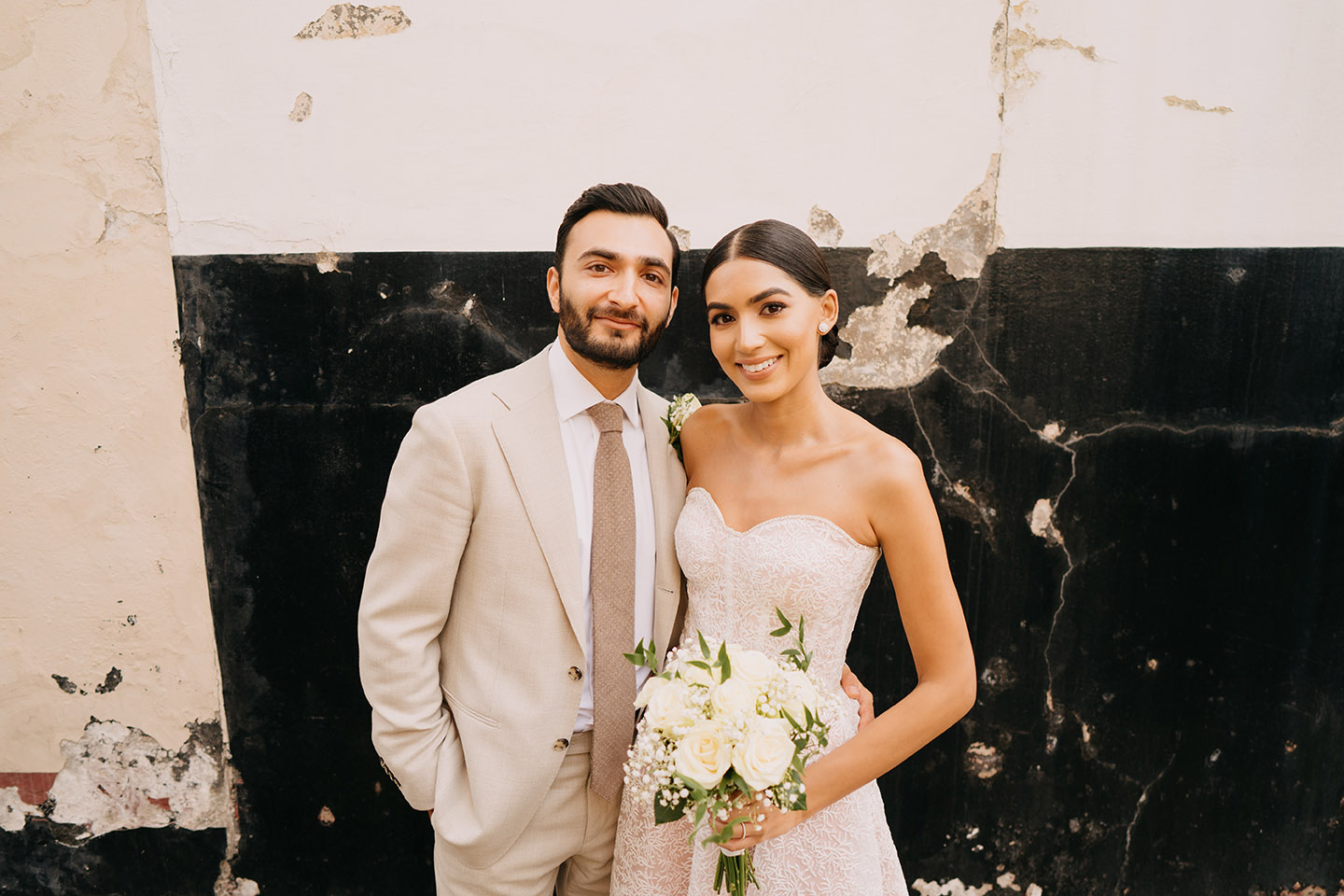 film photography at the old marylebone town hall with couple posing and smiling