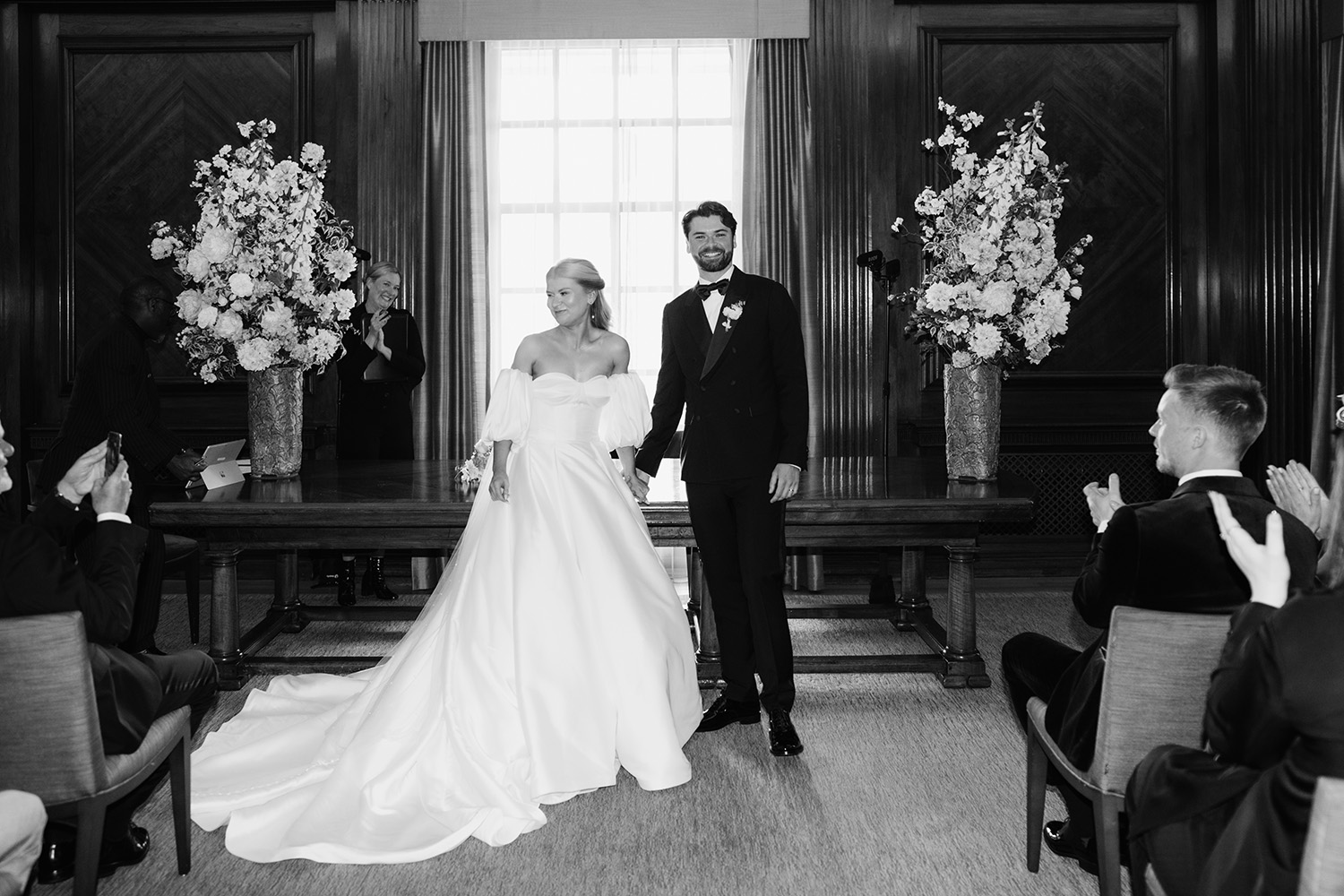 bride and groom at their wedding at the old marylebone town hall, photo in bw