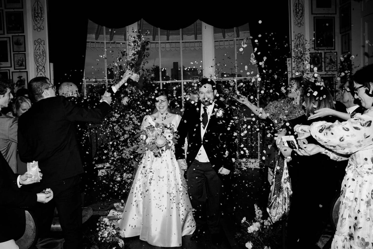 indoor confetti at trafalgar tavern wedding taken with flash by wedding photographer in london