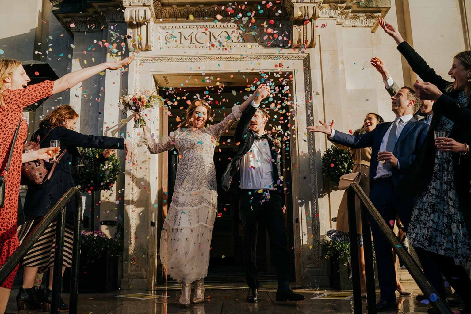 confetti attempt number 2 when sunshine came out after rain on wedding day in london