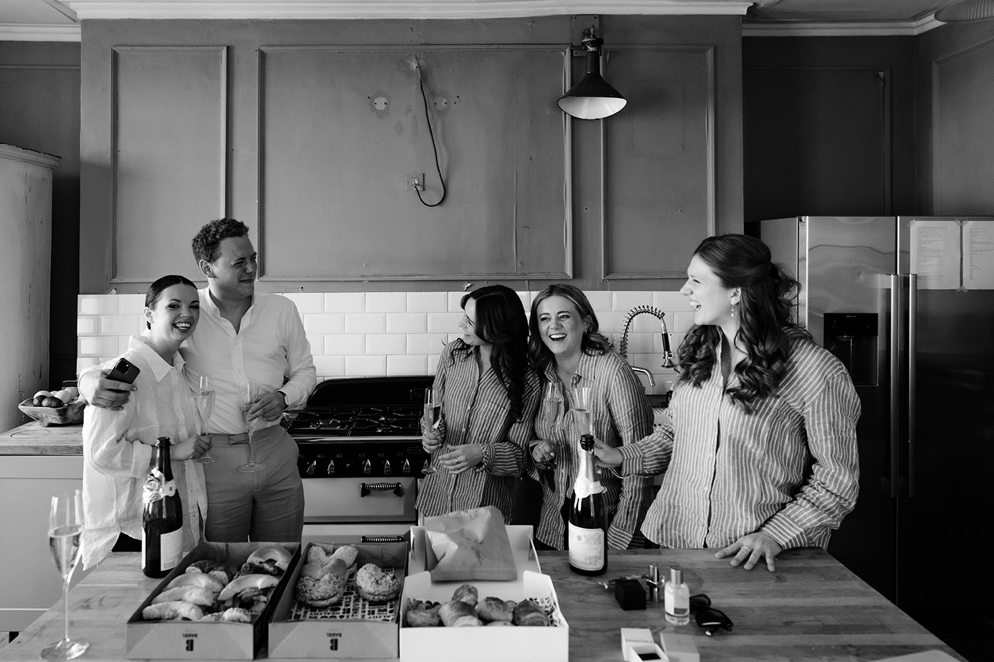 bridal party having fun candid wedding photography